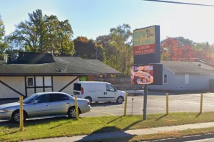 DJ’s Pub in Muskegon, Michigan, where regulators seized suspected illegal gaming machines, cash and gift cards during a gambling investigation.